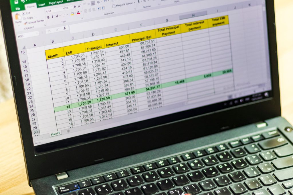 Excel spreadsheet open on laptop with data