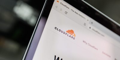 Cloudflare logo on screen. Cloudflare is an American content delivery network and DDoS mitigation company