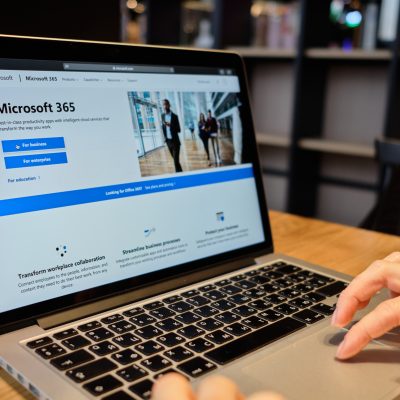 Person using Microsoft 365 on a laptop